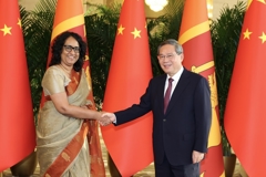 李强会见斯里兰卡总理阿马拉苏里亚