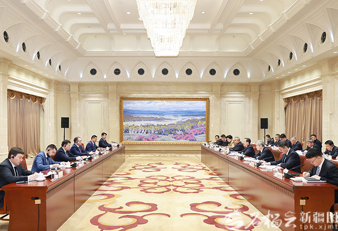 陈小江艾尔肯·吐尼亚孜会见哈萨克斯坦贸易和一体化部部长沙卡利耶夫