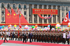 习近平出席金正恩举行的欢迎仪式