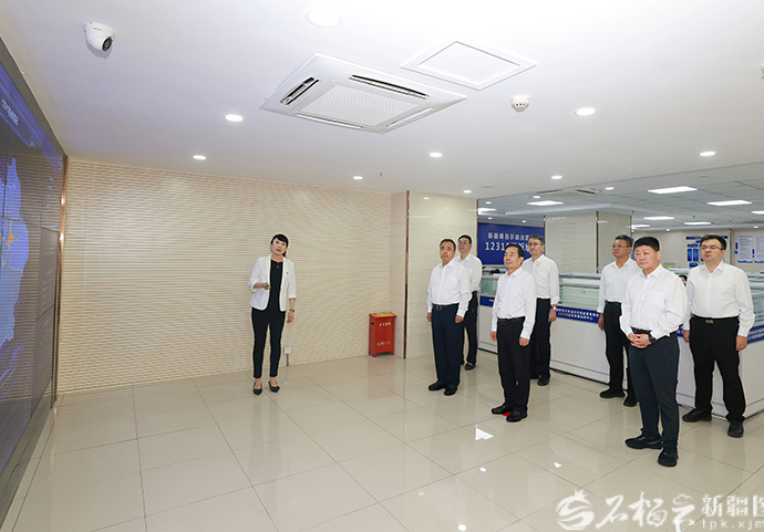 陈小江艾尔肯·吐尼亚孜在自治区市场监管局调研座谈